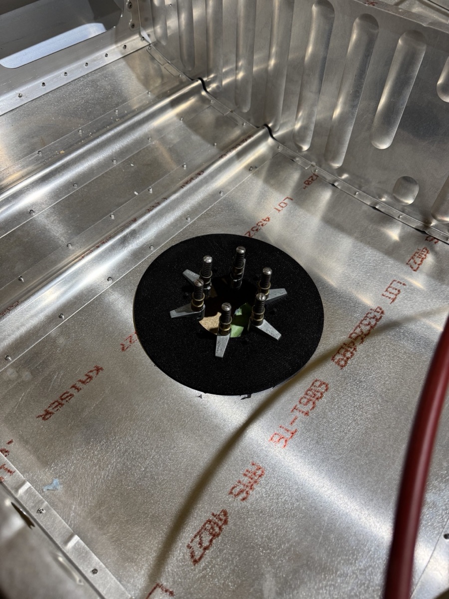 Scupper jig on a top wing skin
